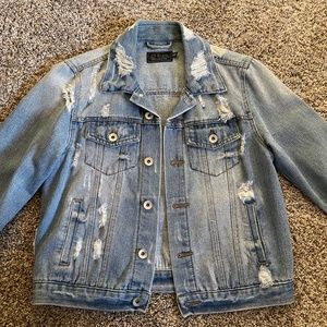 Distressed denim jacket